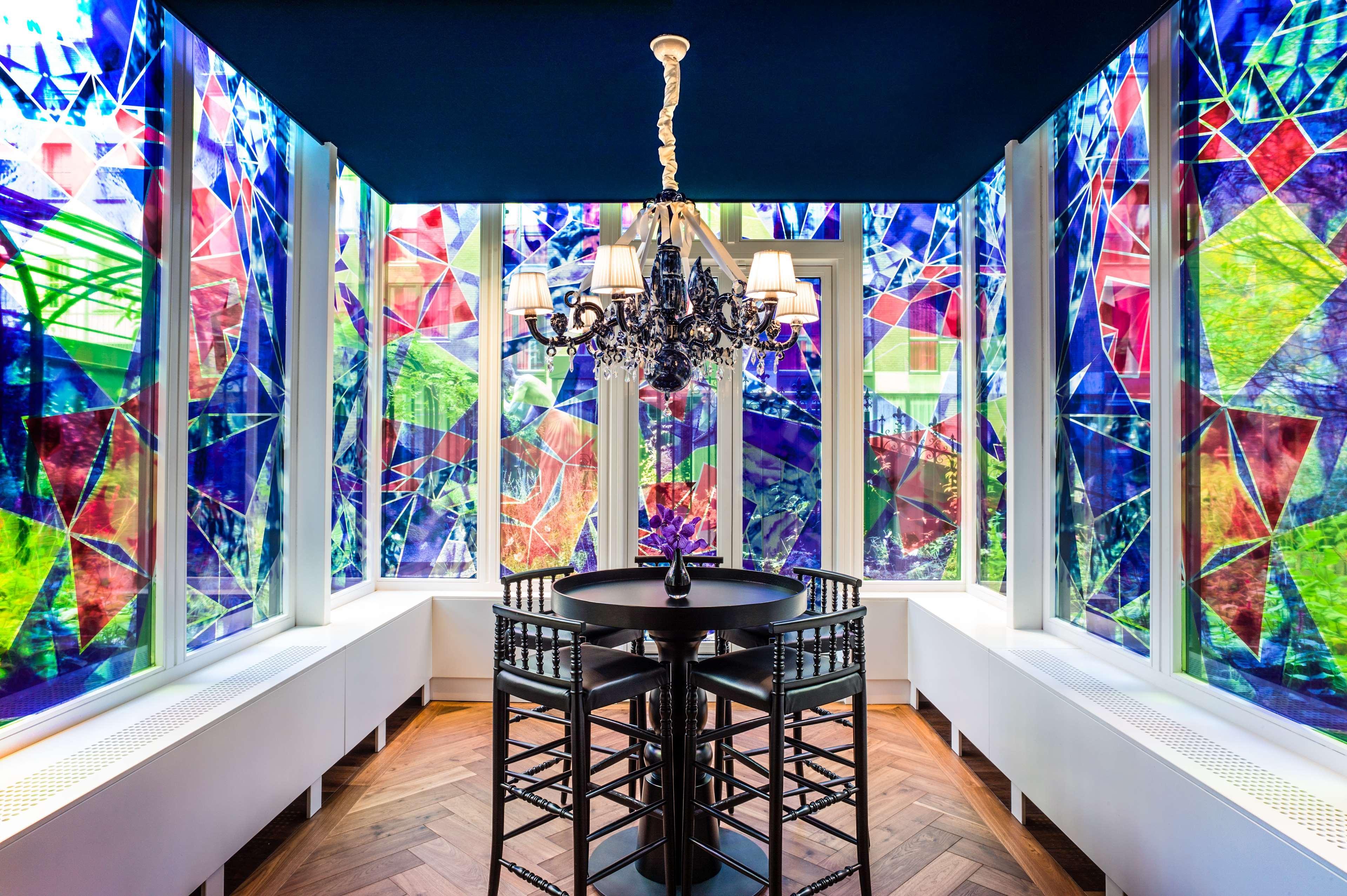 Andaz Amsterdam, Prinsengracht, By Hyatt Esterno foto The stained glass windows at the top of the staircase